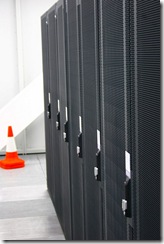 Computers in a datacenter, courtesy Docklandsboy, Creative Commons Attribution 2.0 Generic License